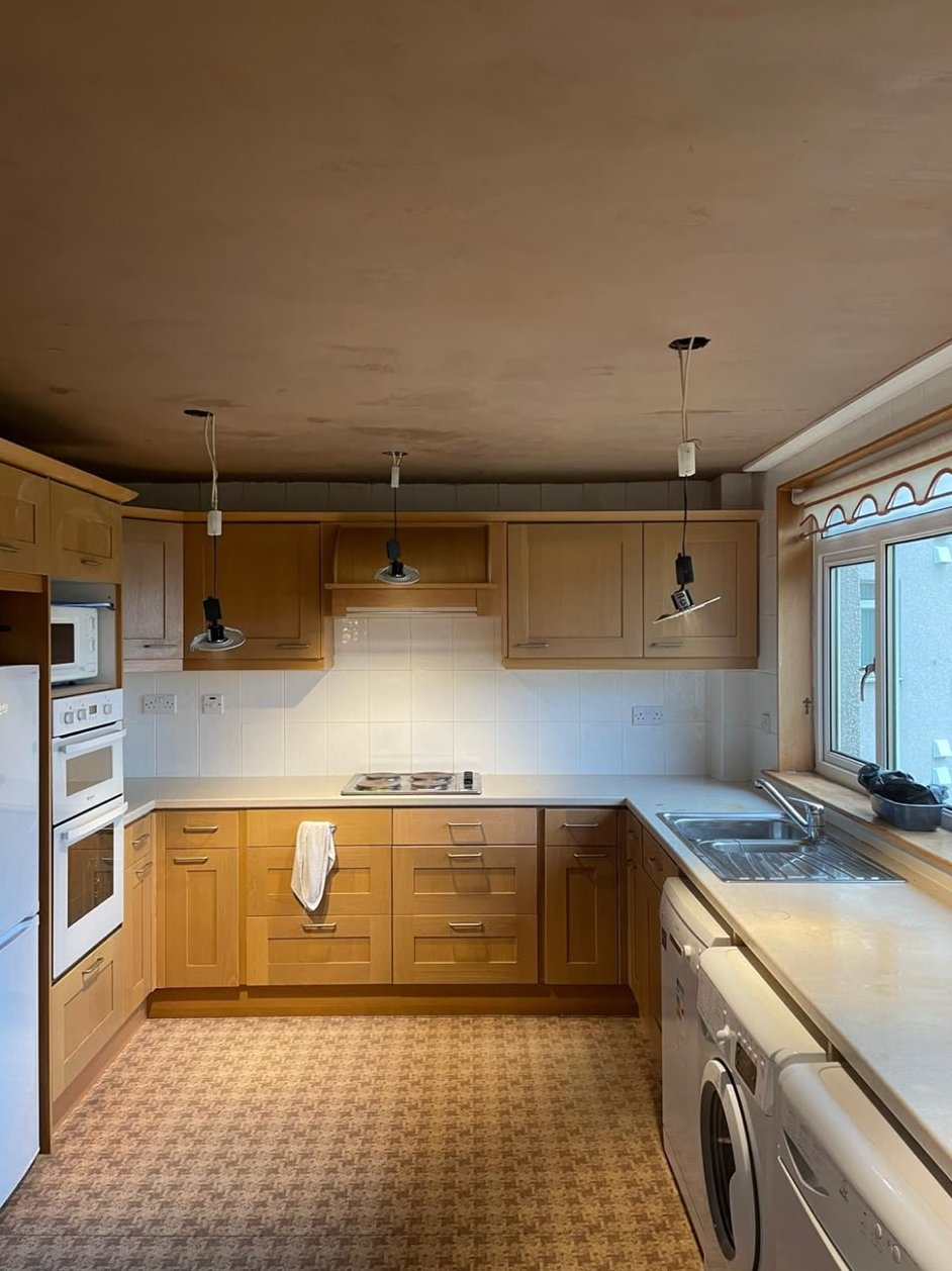 Kitchen ceiling patch repaired and re-plastered after damaged plaster was cut out