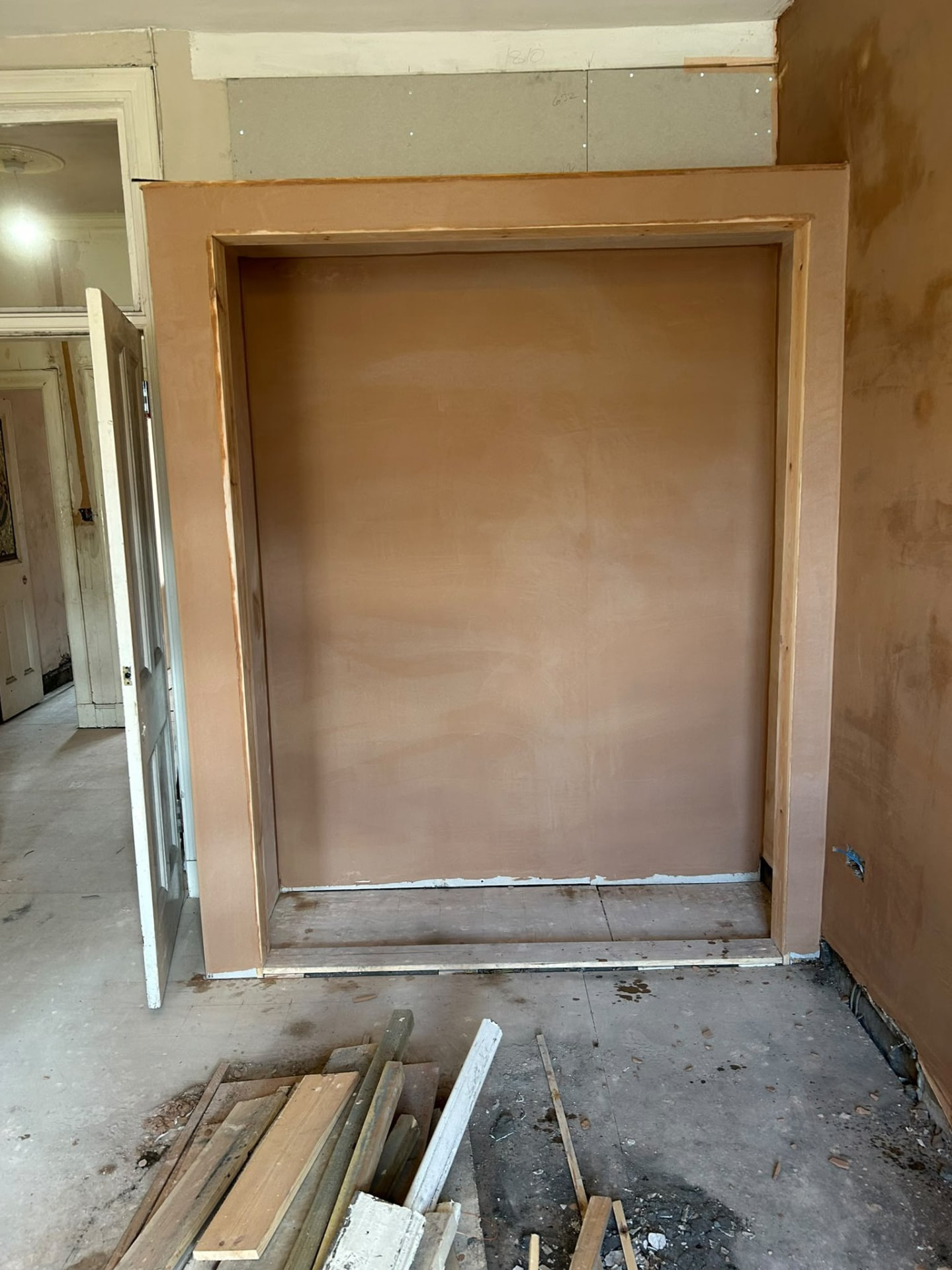 Plasterboarded and skimmed alcove formed in an original doorway during a Glasgow renovation